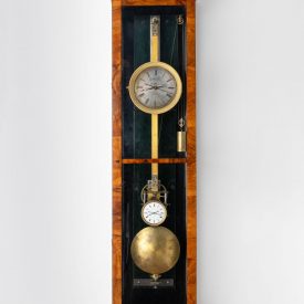 Mechanical weight-driven clock made by Matthaus Hipp, with large lenticular bob and two dials