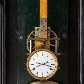 Small dial in front of a Hipp toggle escapement